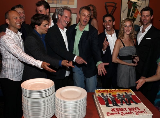Bob Gaudio and Rick Elice cut the Anniversary Cake with Cast Members from Toronto's J Photo
